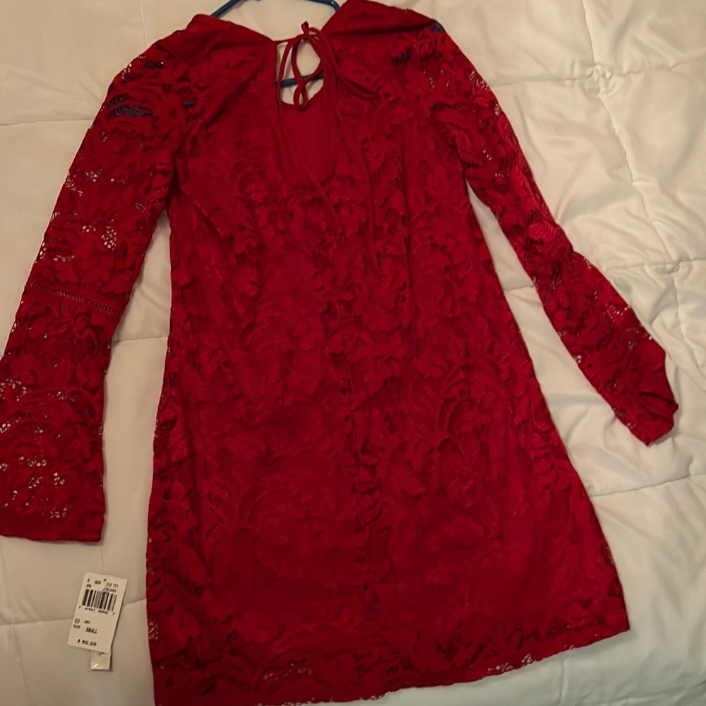 Long sleeve beautiful red dress but to big for me! Not see through! Never worn!